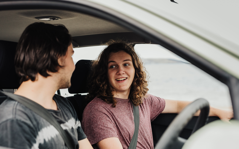 two young males driving