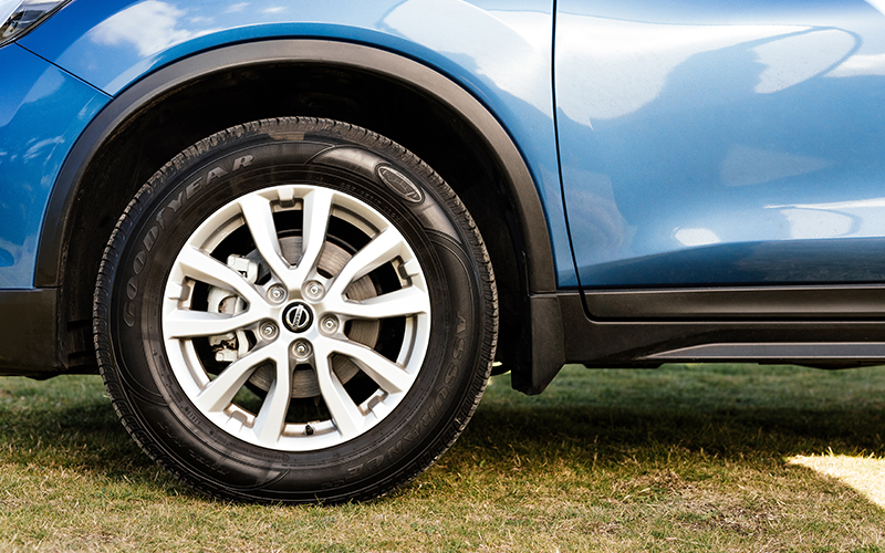 Tyre and blue car