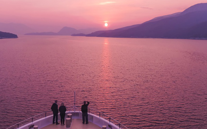 View of Bathurst Channel at sunrise from the top of Coral Explorer cruise ship