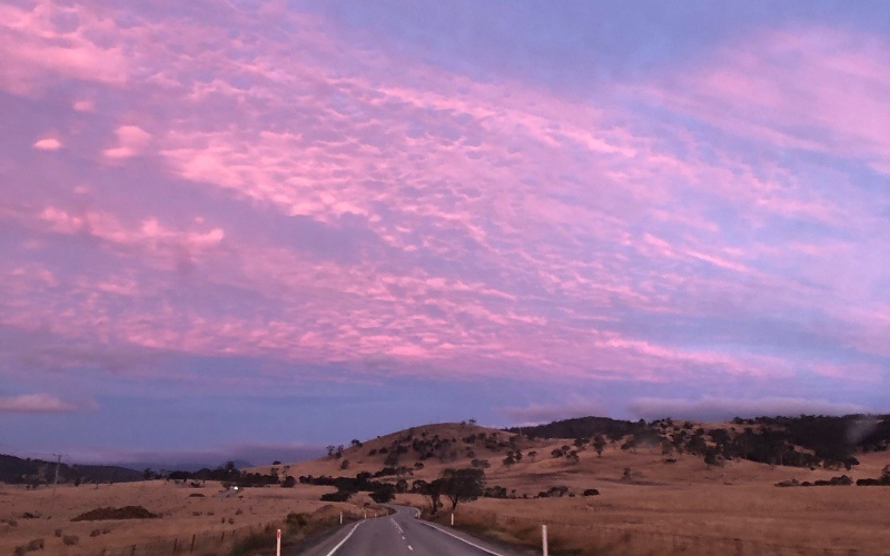 Sunset over the road