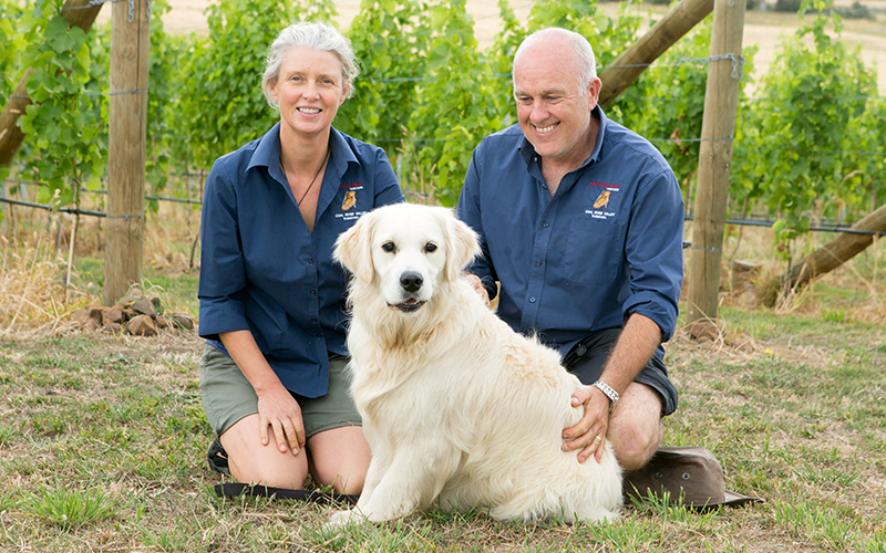 Wobbly point owners with vineyard dog Maeve.