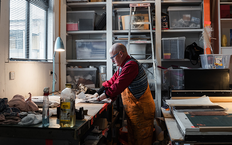 Artist creating work in studio