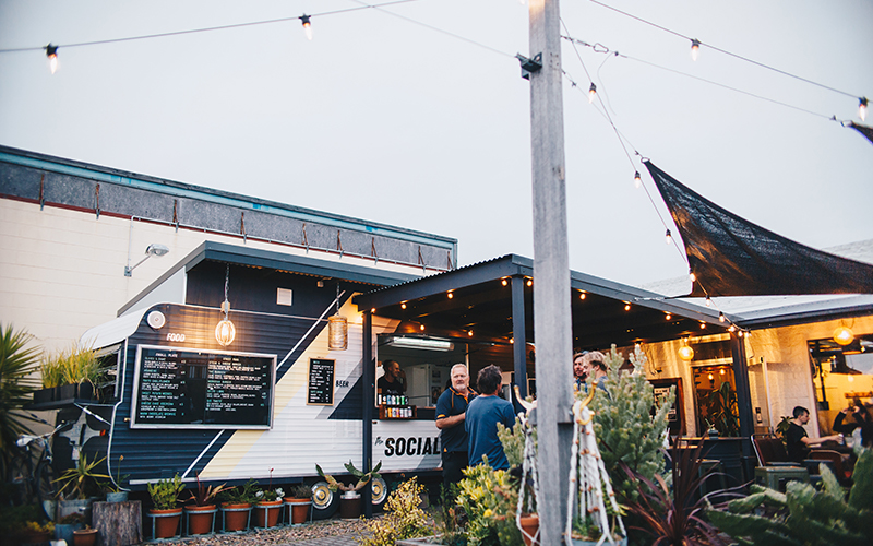 Enjoying a drink at The Social beer garden