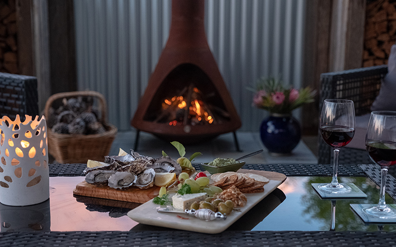 Fire pot, wine and food at Tully Cottage