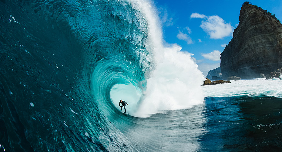 Surfing through the waves at Shipstern