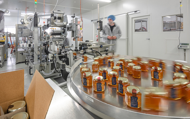 Honey being produced in a factory