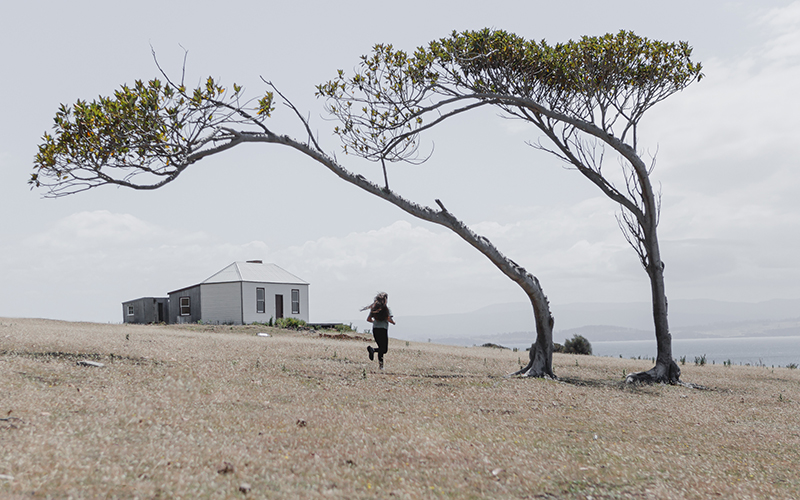 Running in a field on Maria Island