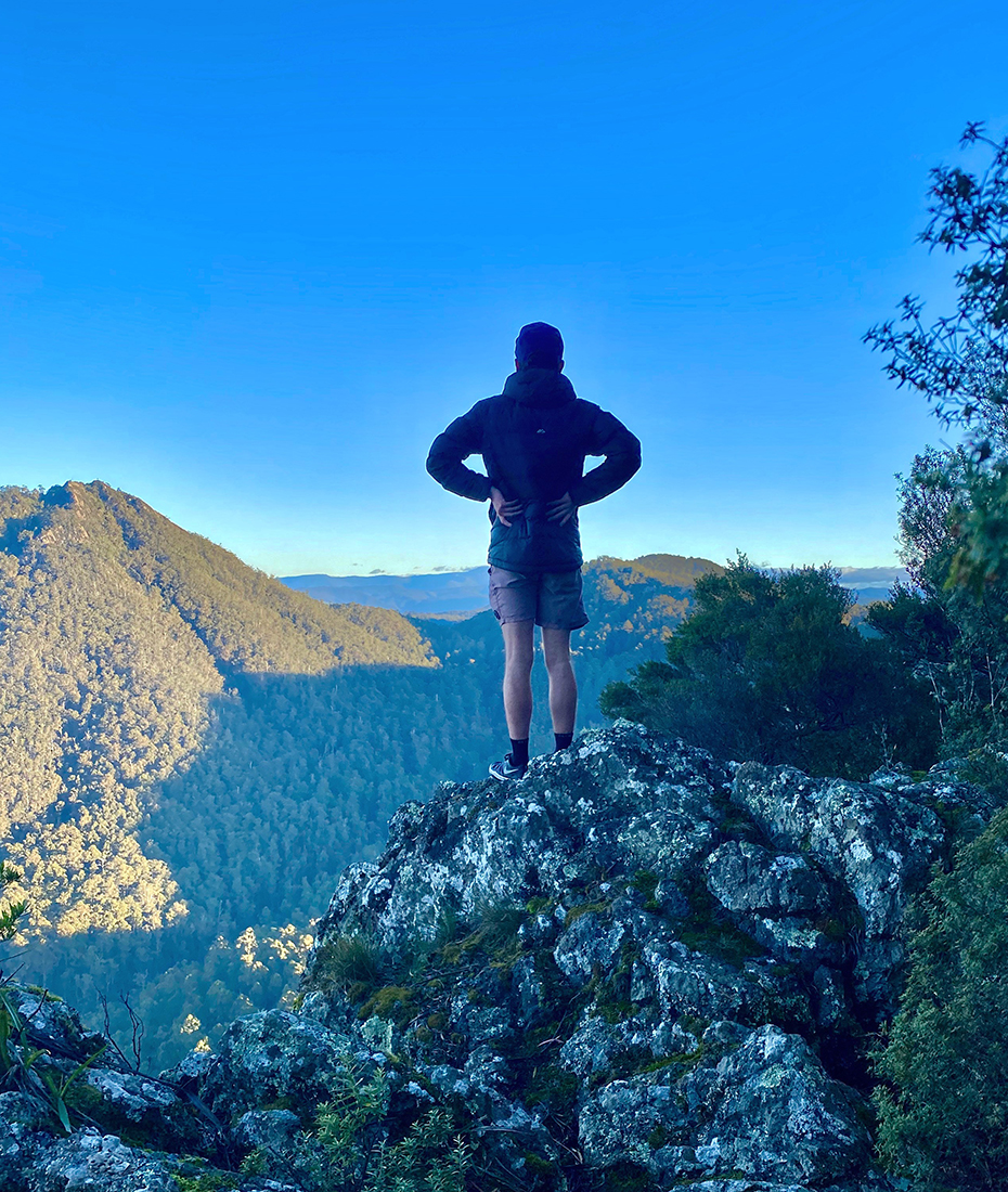 Man standing on top of Dial Range.