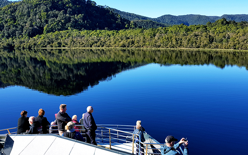 Reflections of the blue sky on the Gordon River