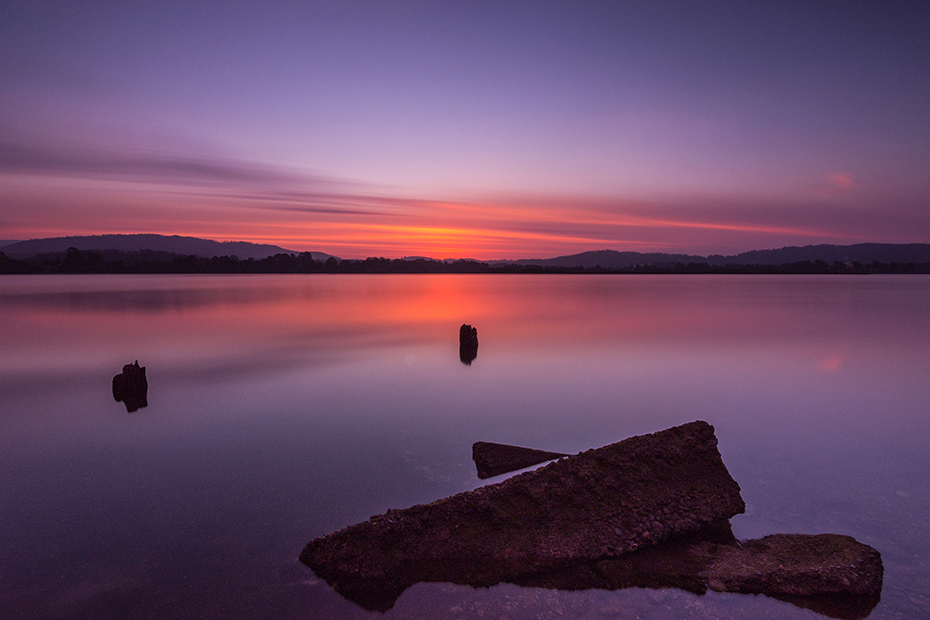 Purple and pink sunrise over the Mersey River