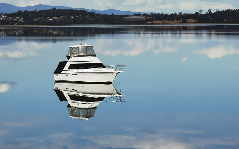 Boat in a glassy Tamar River