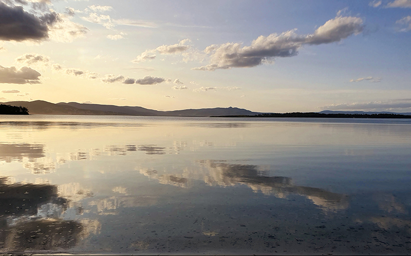 Reflections of sky in the water at Chinamans Bay