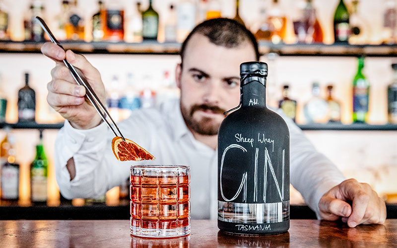 Making a GIN drink at the Glass House