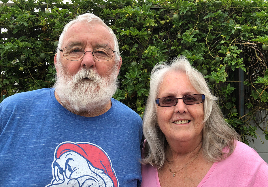 Lynne and Robert Hampson smiling at the camera