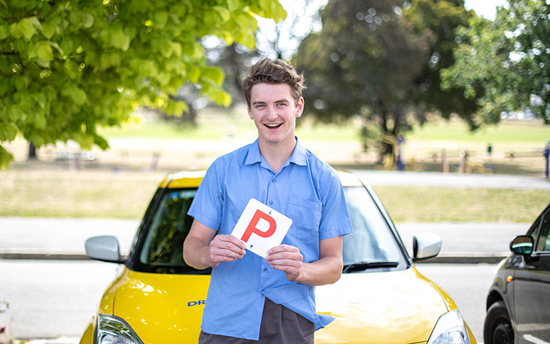 Learner driver holding P Plates