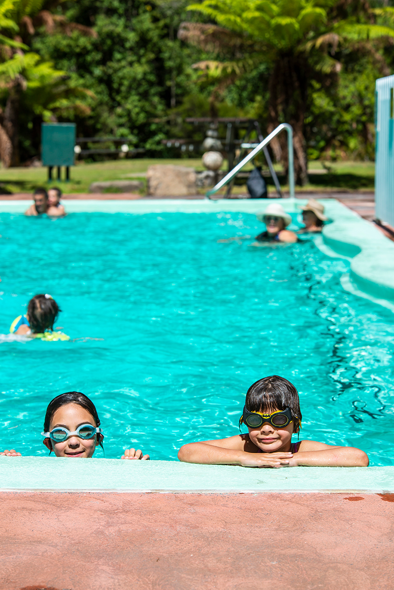 Kids swimming at the pool at Hastings Thermal Springs