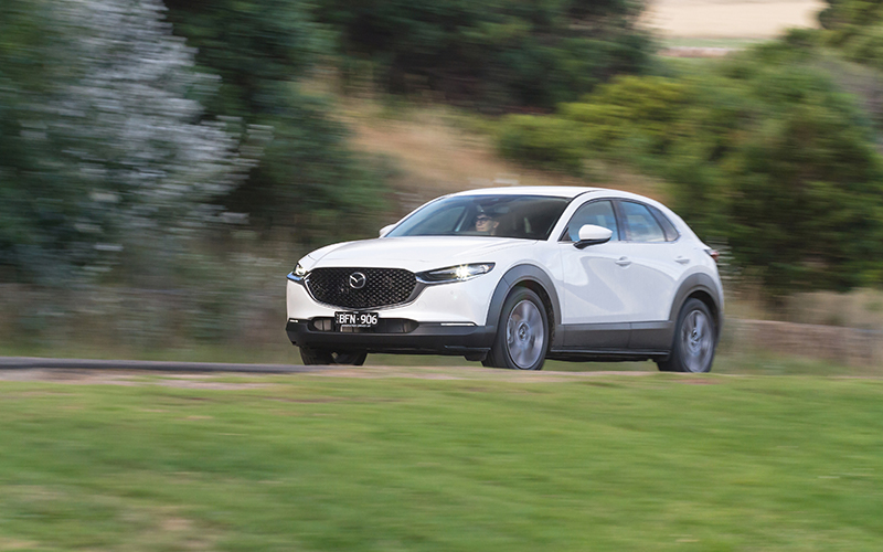 White Mazda CX30 on highway