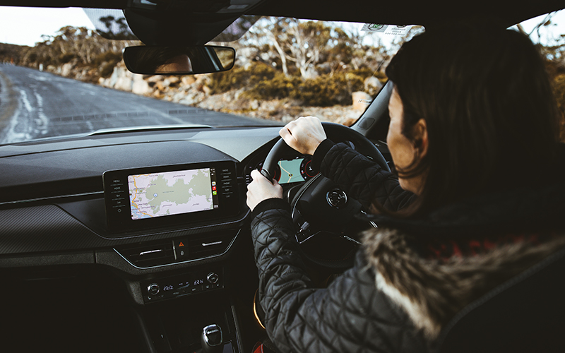 Woman driving up Mount Wellington in Skoda Kamiq