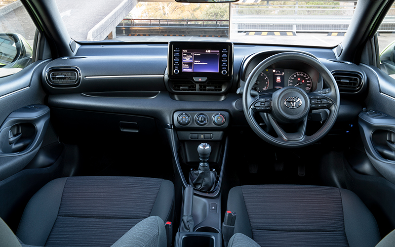 Front interior and steering wheel of new Toyota Yaris