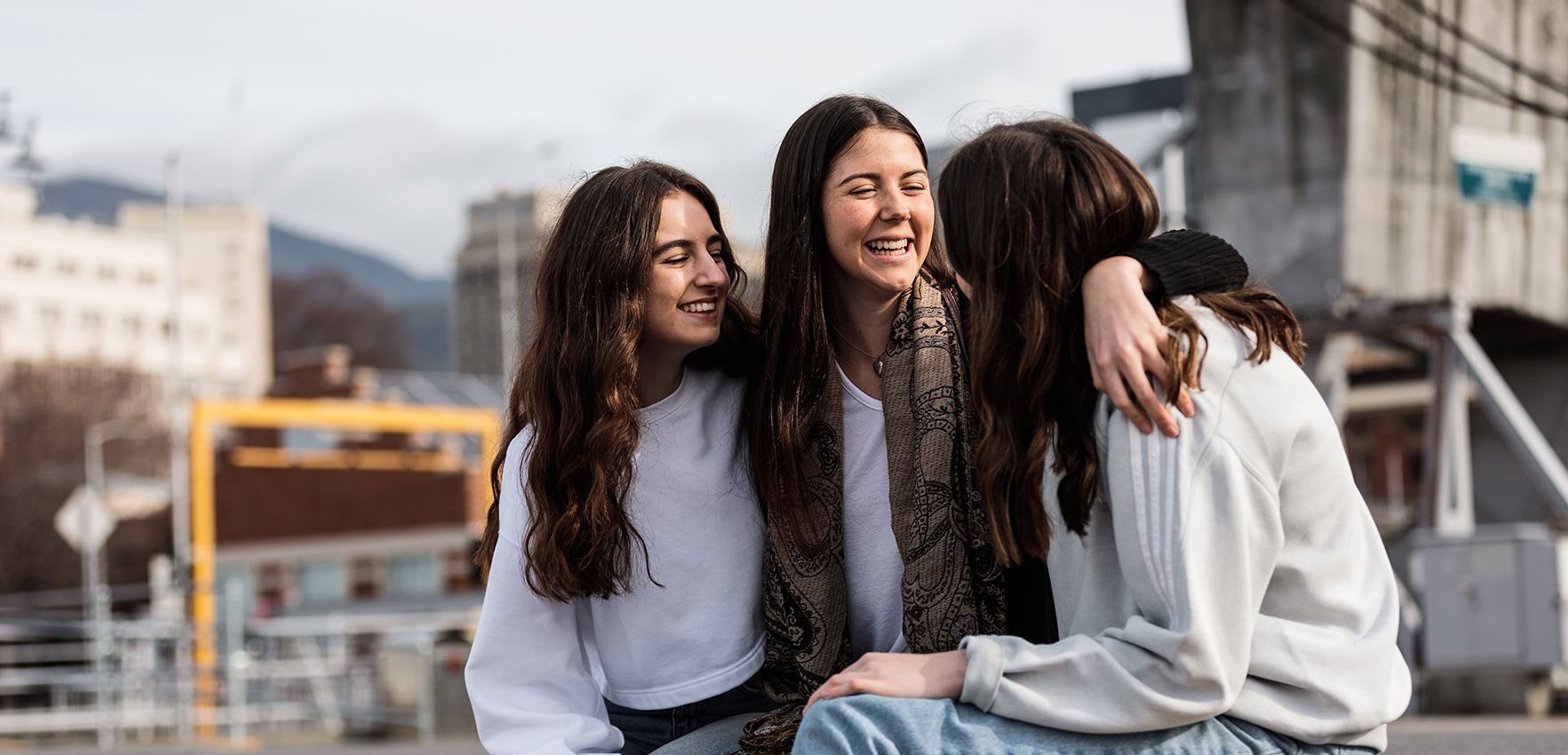 Three girls talking