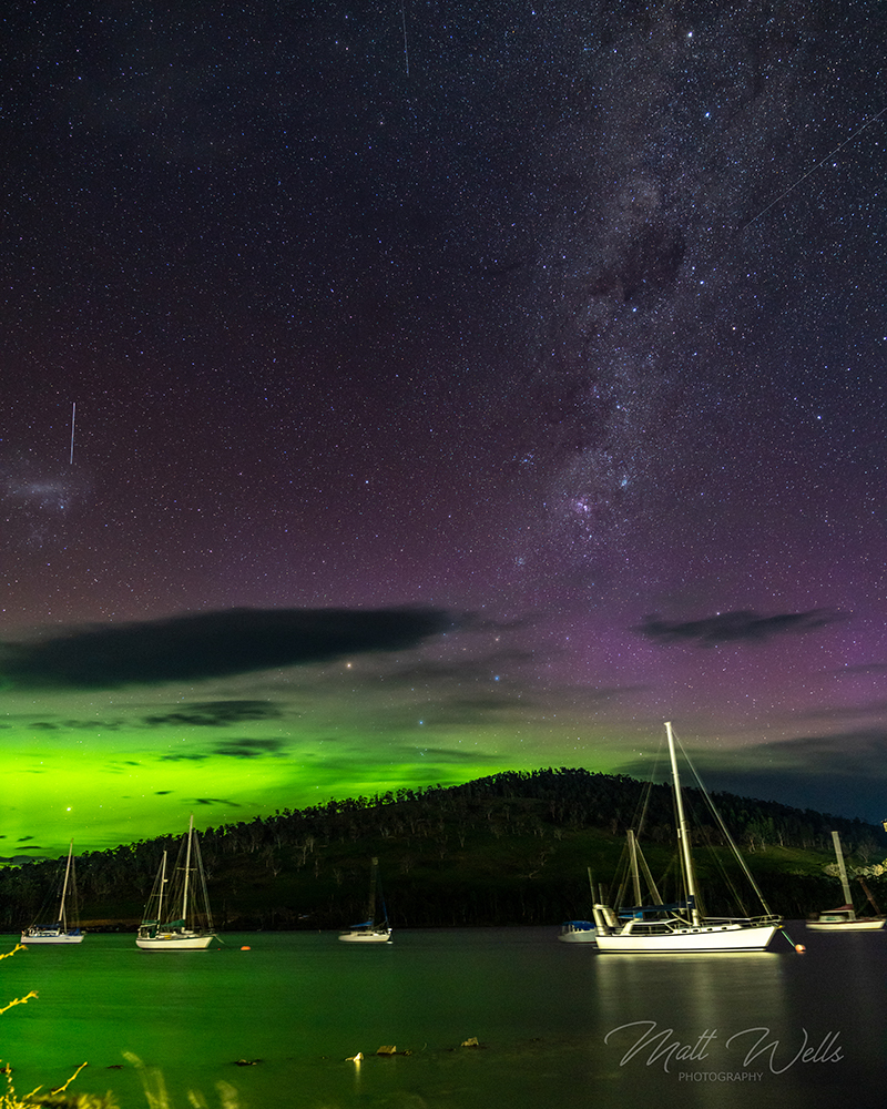 A green and purple aurora at Port Huon