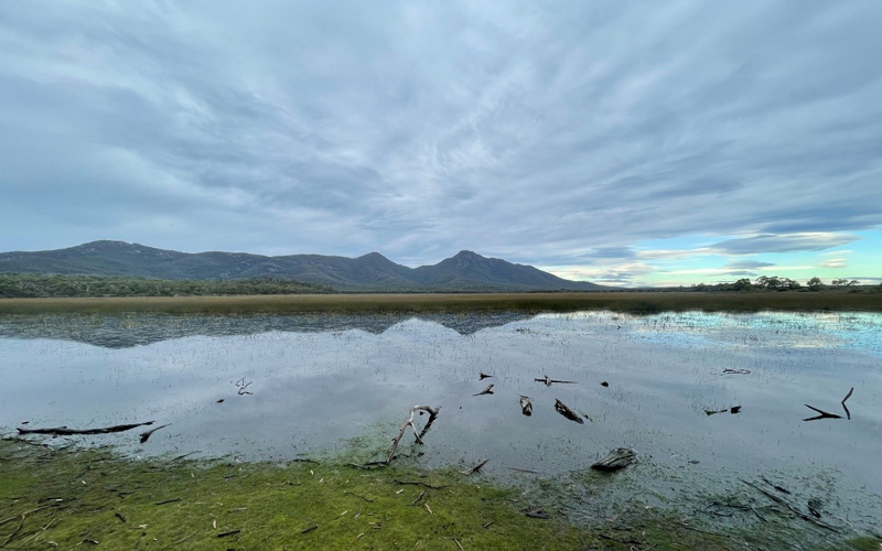 A natural lagoon with mountain views