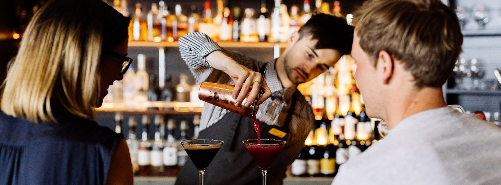 Cocktail maker pouring at Hazards Bar