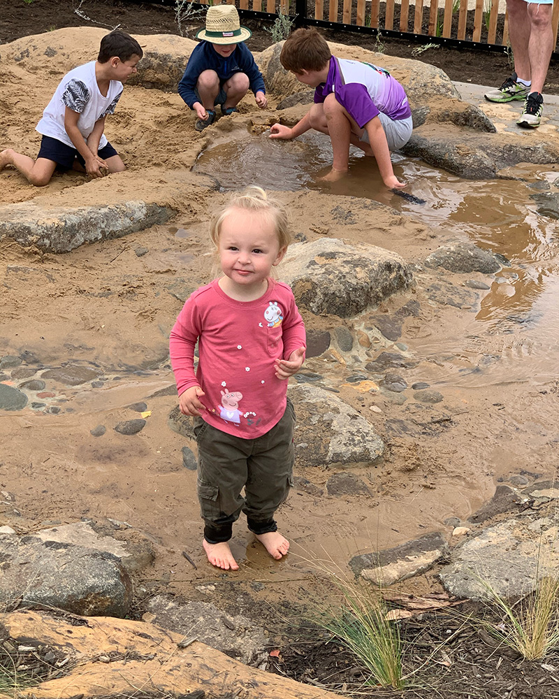 Kids playing in water at new Kingston park